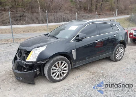 2014 Cadillac Srx Luxury Collection z USA, uszkodzony, nr VIN 3GYFNBE34ES560494